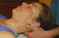 Releasing tension with neck massage.